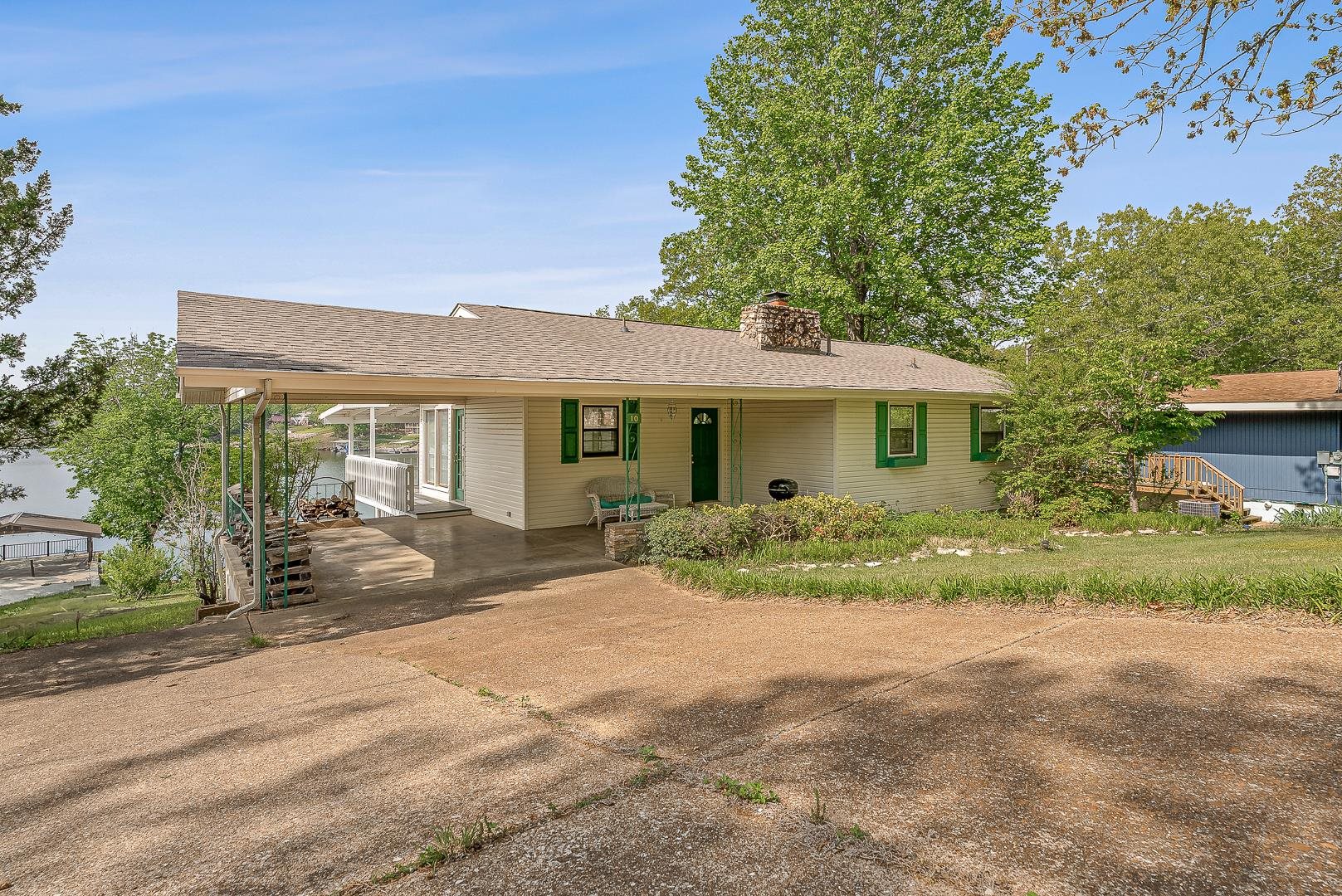 Don't miss this fully furnished 3-bedroom, 2.5-bath gem on beautiful Lake Thunderbird! From the soaring vaulted family room to the wall of windows flooding the kitchen and living areas with natural light, every inch of this home is designed to maximize your lake view. Enjoy a fire in the indoor fireplace or outside in a firepit anytime of year. The double balconies offer the perfect spots for morning coffee, afternoon lounging, or sunset cocktails. The gently sloping lawn leads straight to your private boat and swim dock ready for endless days of boating, swimming, fishing, paddleboarding, kayaking, and more! Lake Thunderbird is the ultimate family-friendly destination for all your outdoor adventures. This home is move-in ready just bring your personal touches and start living the lake life you've always dreamed of. Whether you're looking for a full-time home, a weekend getaway, or a fantastic Airbnb opportunity, this property checks all the boxes. Your perfect lake escape is waiting come see it today!