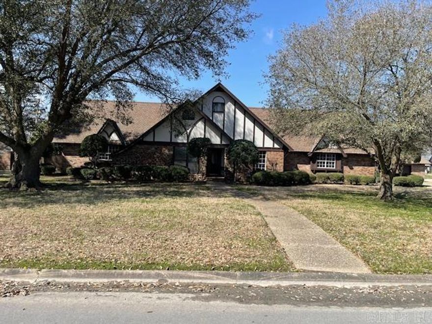 Welcome to your dream home! This exquisite mid-century custom-built residence strikes a perfect balance between spaciousness, comfort, and style. Featuring five generously sized bedrooms and three and a half baths, this home is centrally located in the coveted Eastwood Addition. The main level boasts of an expansive master bedroom with extensive dressing and closet areas. The inviting den and family room, centered around a stunning stone fireplace, create an ideal space for cozy family gatherings. Additionally, a formal dining room is perfect for entertaining guests, and large office area is well-suited for remote work or study. The upper level offers four bedrooms, two baths, along with a versatile area that can serve as a study or game room, allowing for flexibility. Numerous large closets throughout the home ensure ample storage. The beautifully enclosed backyard is designed for relaxation with its brick fence, large in-ground swimming pool, and covered patio, perfect for outdoor entertaining. A detached brick garage provides additional storage. Recent updates, including a roof with premium asphalt shingles enhanced with copper gutters ensure durability and aesthetic appeal.