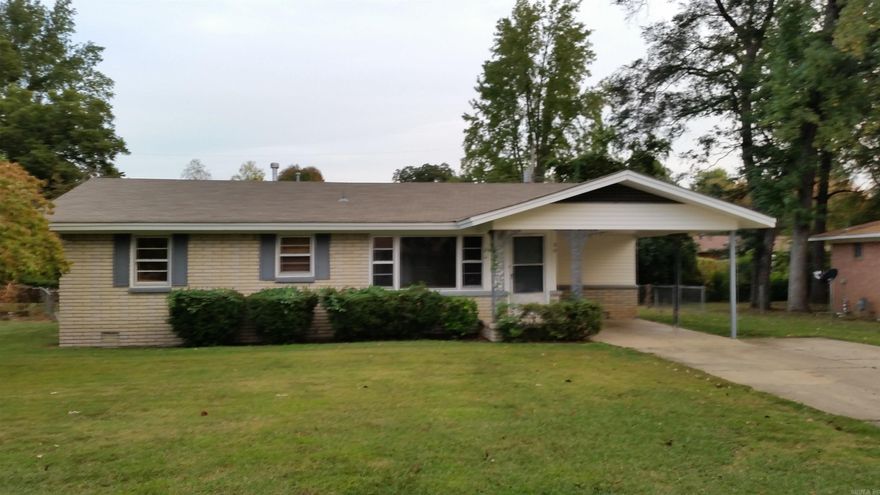 This is a 3 bedroom, 1 1/2 bath, large living room, kitchen and dining combo with french doors exiting to the back yard.  Separate laundry room.  Single car carport, storage building inside the chain link fenced back yard. No longer rented!