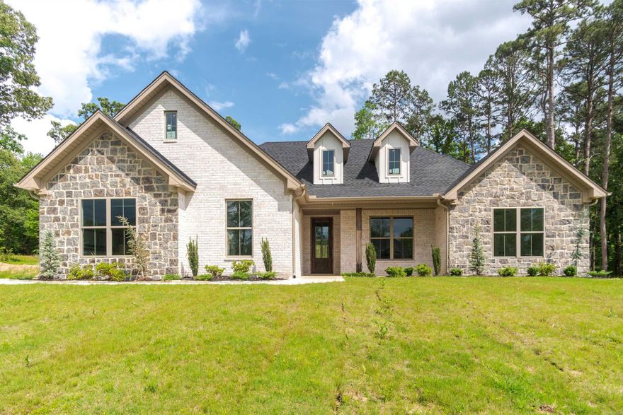 Buyers transfer fell out! Get it while you can. Amazing price on new construction in Bryant Schools on almost 1.5 acres. This stunning home features vaulted ceilings in the great room with a cozy wood burning fireplace. Gorgeous hardwood flooring through out all the common areas and a stylish open plan. Oversized primary suite with double closet space and a dreamy bath. Large covered back patio and a partially fenced back yard. All this PLUS builder is offering $7,500 IN CLOSING COSTS!! Agents see remarks.