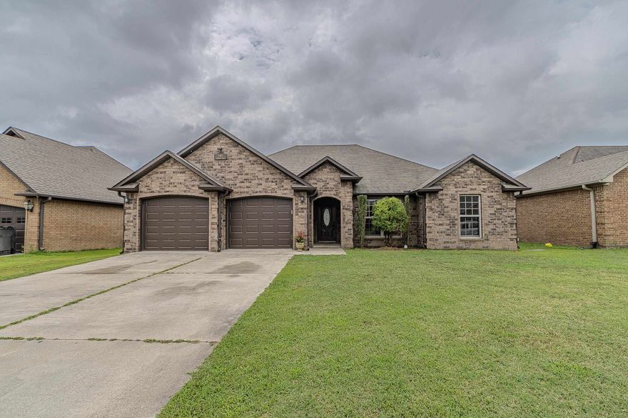 This all-brick home features 3 spacious bedrooms, 2 baths, and an open floor plan with fresh paint throughout. The kitchen is complete with granite countertops, a trendy tile backsplash, and a cozy breakfast nook. The spacious primary suite includes a separate shower and soaking tub, while crown molding adds charm to the living area. Enjoy a fenced-in backyard, and the added convenience of two water heaters. Refrigerator, washer, and dryer all stay - making this home truly move-in ready!
