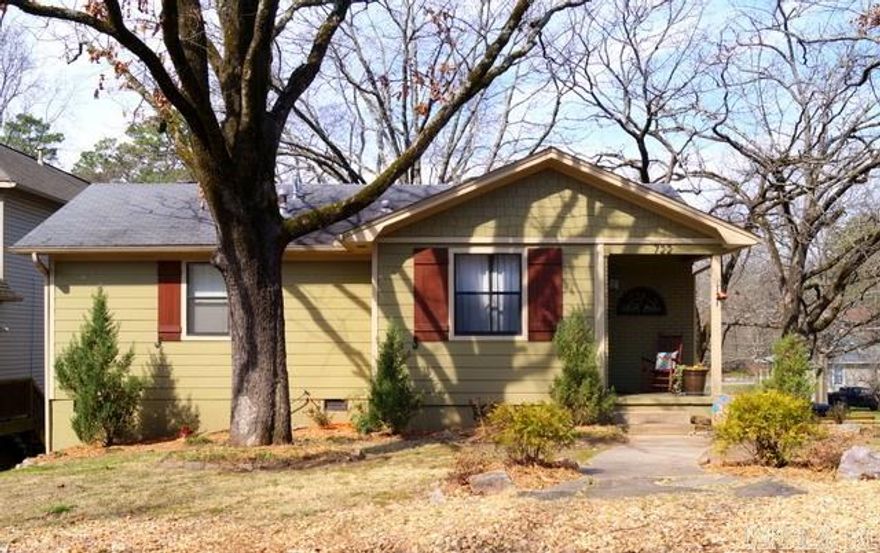 Right in the heart of it all- UAMS, Mid Town, close to Heights and Hillcrest. This cottage has two living areas, one up and one down, with two bedrooms and baths up and one bedroom and bath downstairs. Large backyard and expansive decking.