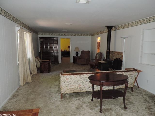 Walk to Lawrence Landing, spacious family room with wood burning stove, sits on 3 lots. Open kitchen to breakfast area w/bay window, large laundry with plenty of storage, 2 outside detached outbuildings. Square footage per measurements. Vacant lot to south & west of house, perfect for weekend getaway! Call today. See agent remarks