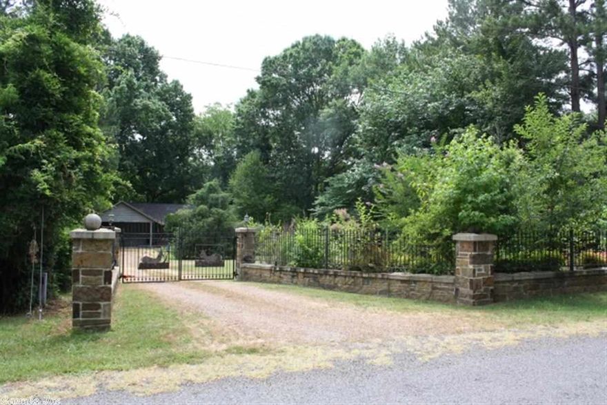 THIS IS IT !!! The Little Red River front home that’s more than just a getaway retreat, it could be your year-round vacation home. Large, open living room with wood-burning rock fireplace. Split bedroom floorplan & over-sized master suite with jetted tub & separate shower. 330 sf screened porch with views overlooking the river & your shared dock. Lower level rock patio for additional outdoor entertaining. Gated entrance with rock & iron fence with double iron gates. 2 car carport with ample outside storage.