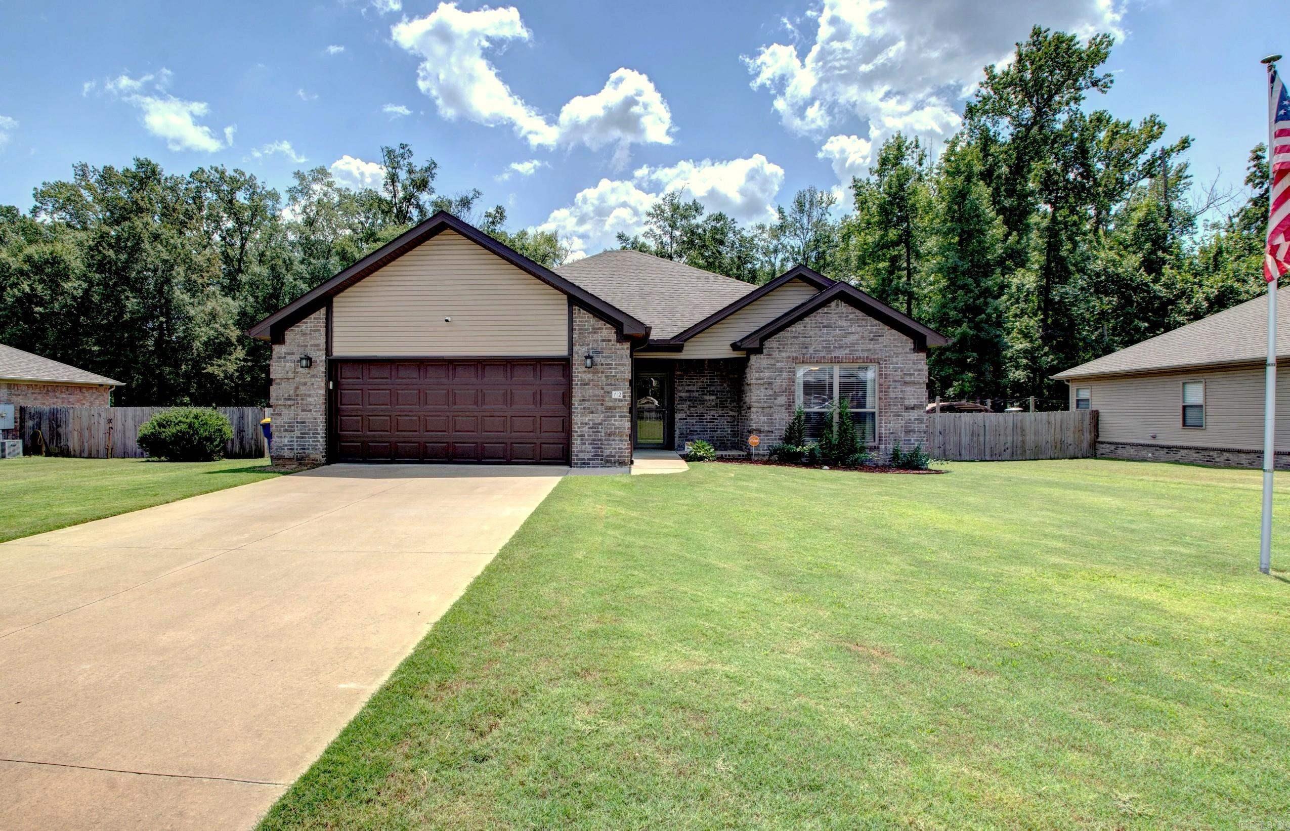 Welcome to this move-in ready gem in the heart of Cabot! This 3-bedroom, 2-bath home offers a warm and inviting open floor plan, perfect for everyday living and entertaining. Youāll love the hardwood-look tile flooring throughoutāno carpet means low-maintenance and easy cleaning! The spacious living area features a tray ceiling and flows seamlessly into a beautiful kitchen complete with granite countertops, a designer tile backsplash, stainless steel appliances, a pantry, and custom cabinetry. Natural light fills the space, highlighted by stylish custom shades that add both comfort and charm. The split floor plan offers privacy, with a large primary suite that boasts double vanities and two generous walk-in closets. Step outside and enjoy the peaceful 10x18 covered back porchācomplete with an adorable swingāoverlooking a fully fenced backyard with direct views of a city park and walking trail. Whether youāre sipping coffee in the morning or relaxing in the evening, the outdoor space is truly a highlight. This home combines comfort, convenience, and thoughtful design in a great location. Donāt waitāhomes like this donāt stay on the market long. Schedule your showing today! *REMARKS*