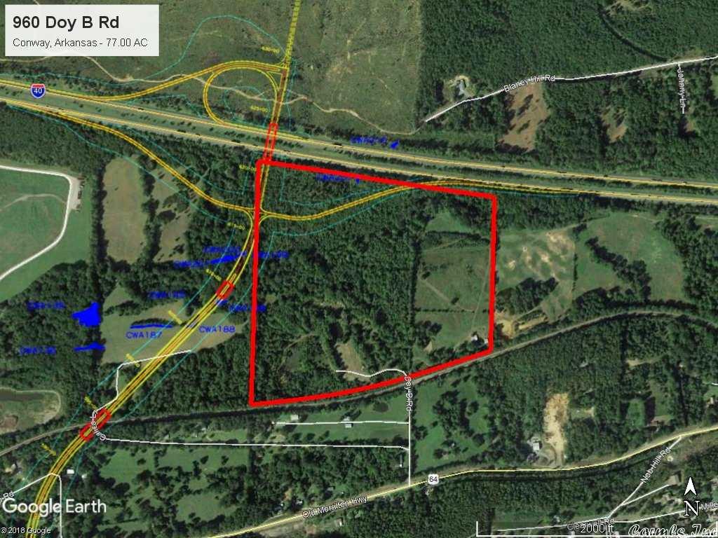 PRIME COMMERCIAL PROPERTY with great development potential. This +/- 77.00 acre parcel of land has almost 2,000 feet of I-40 frontage and is located adjacent to Union Pacific railroad just north of Hwy 64 W in West Conway. Potential rail access and adjacent to future location of the Conway Western Loop northern terminus I-40 interchange.