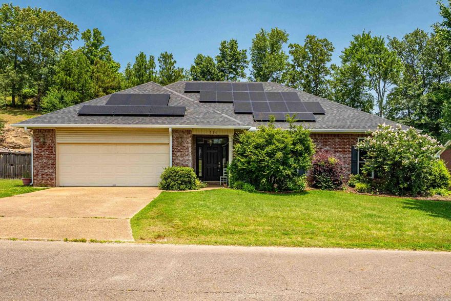 Welcome to this charming and energy-efficient one-story home located in the highly sought-after Lake Hamilton School District. Enjoy the perfect blend of comfort and convenience with a spacious layout, solar panels for low utility costs, and a voluntary lake access fee to boat launch that offers the perks of lakeside living without the pressure of HOA dues. Whether you're relaxing indoors or enjoying the nearby lake, this property is a perfect place to call home. LOOK AT WHAT ALL IS NEW IN 2023......... roof, gutters, windows, and siding on back of home, farmhouse sink, attic insulation!!  HVAC is 2022 and comes with a twice a twice a yr service plan.