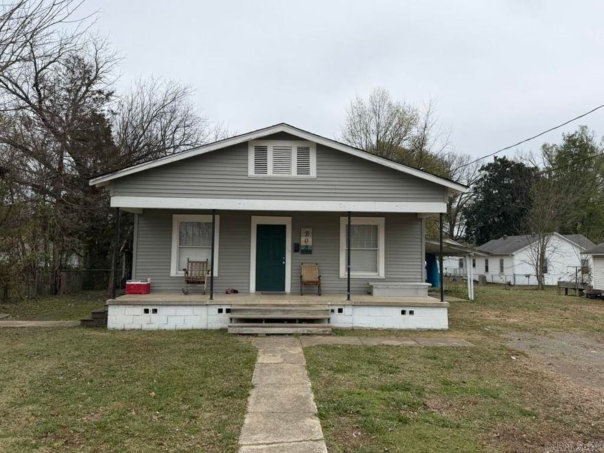 This 3BR 2BA home offers a functional layout with great potential, featuring a spacious covered front porch perfect for relaxing or greeting guests. Whether you're looking to add to your rental portfolio or searching for a property to update and make your own, this one checks the boxes. Conveniently located near schools, shopping, and downtown amenities. Agents see remarks.