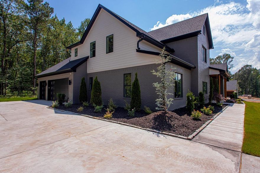 Discover this stunning custom home nestled within the peaceful Bryant school district, offering unparalleled privacy in an exclusive, neighborhood set on a one-acre wooded lot. This home features an exceptional floor plan designed to accommodate all your needs, highlighted by an expansive oversized kitchen boasting a massive pantry and abundant cabinet space. The luxurious Primary Suite includes a walk-around shower, large soaking tub, and a large custom closet. Throughout the home, you'll find numerous modern upgrades and finishes. Step outside to enjoy the secluded backyard and expansive covered patio complete with a cozy fireplace, perfect for relaxation and entertaining alike. Come see!