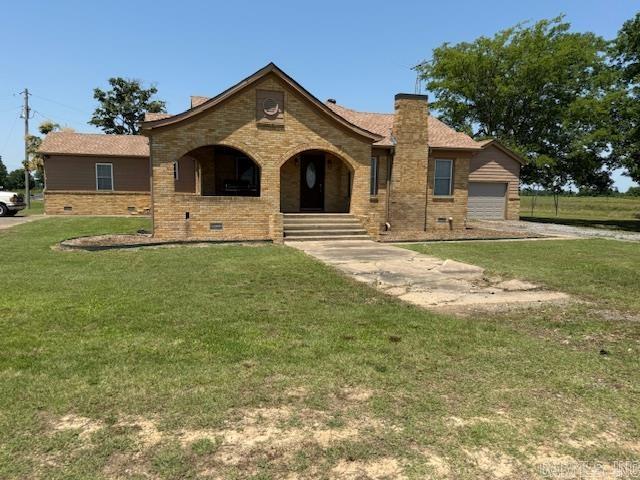Perfect family home or an excellent hunting and fishing lodge and camp. Just minutes away from several boat ramps for hunting and fishing. Welcome to this updated, mid-century brick home in a lovely rural setting with mature trees on an acre corner lot. This 3-bedroom, 3-bath home features two large, spacious living areas, one of which has a gas log fireplace. There is an office off one of the living areas. The kitchen has new stovetop. The refrigerator and washer and dryer convey with the property. The tankless hotwater heater is new 2024. 5 ton HVAC unit. High speed internet is available. East Prairie Water System. The new architectural shingle roof is 1 month old. Brick outside storage building. 2023 survey.