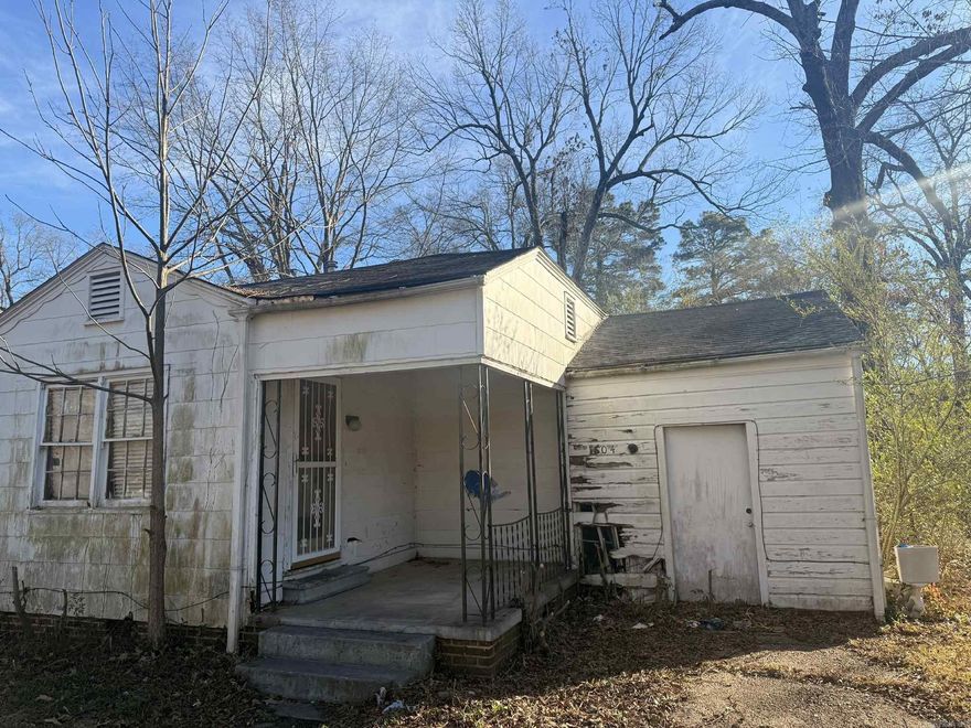 3 bedroom, 1 bath home in need of extensive repairs. Property is being sold as-is and will require significant renovation throughout. Owner financing is available with acceptable terms. Property will be conveyed by Limited Warranty Deed or Quit Claim Deed. Ideal opportunity for investors or buyers looking for a full rehabilitation project. No utilities are on; buyer to verify all information including square footage, condition, and potential use. Cash, owner financing, or renovation financing recommended.  AGENTS SEE REMARKS