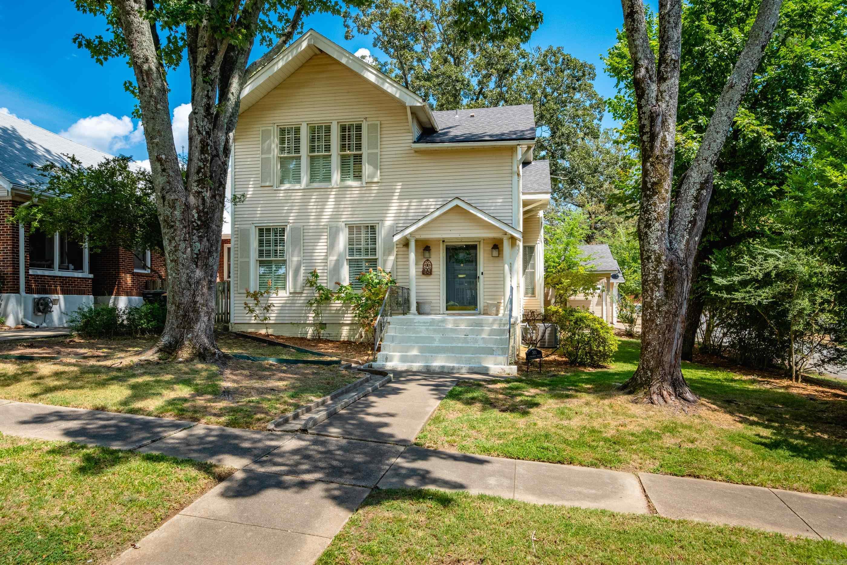 Spectacular Hillcrest home on a wonderful corner lot offers timeless charm with modern updates. Beautiful pool, thoughtfully remodeled guest house and two-car carport. The main floor features large kitchen and breakfast room with abundant natural light, a formal dining room with original French doors and transom, and a spacious formal living room with fireplace and coffered ceilings, an additional den/tv room, half bath and laundry room. Upstairs features 4 bedrooms and 2 baths. The home features 4 bedrooms and 2.5. Nice primary suite with spa inspired bath, double vanities, separate shower, and two separate closets. The versatile fourth bedroom upstairs could also serve as office, sunroom, or playroom. With soaring 10-foot ceilings and Hillcrest character throughout, this home is a rare blend of history and convenience. The updated guest house has a studio floorplan with large open area, kitchen and full bath, could be a great home office, guest space or ADU.