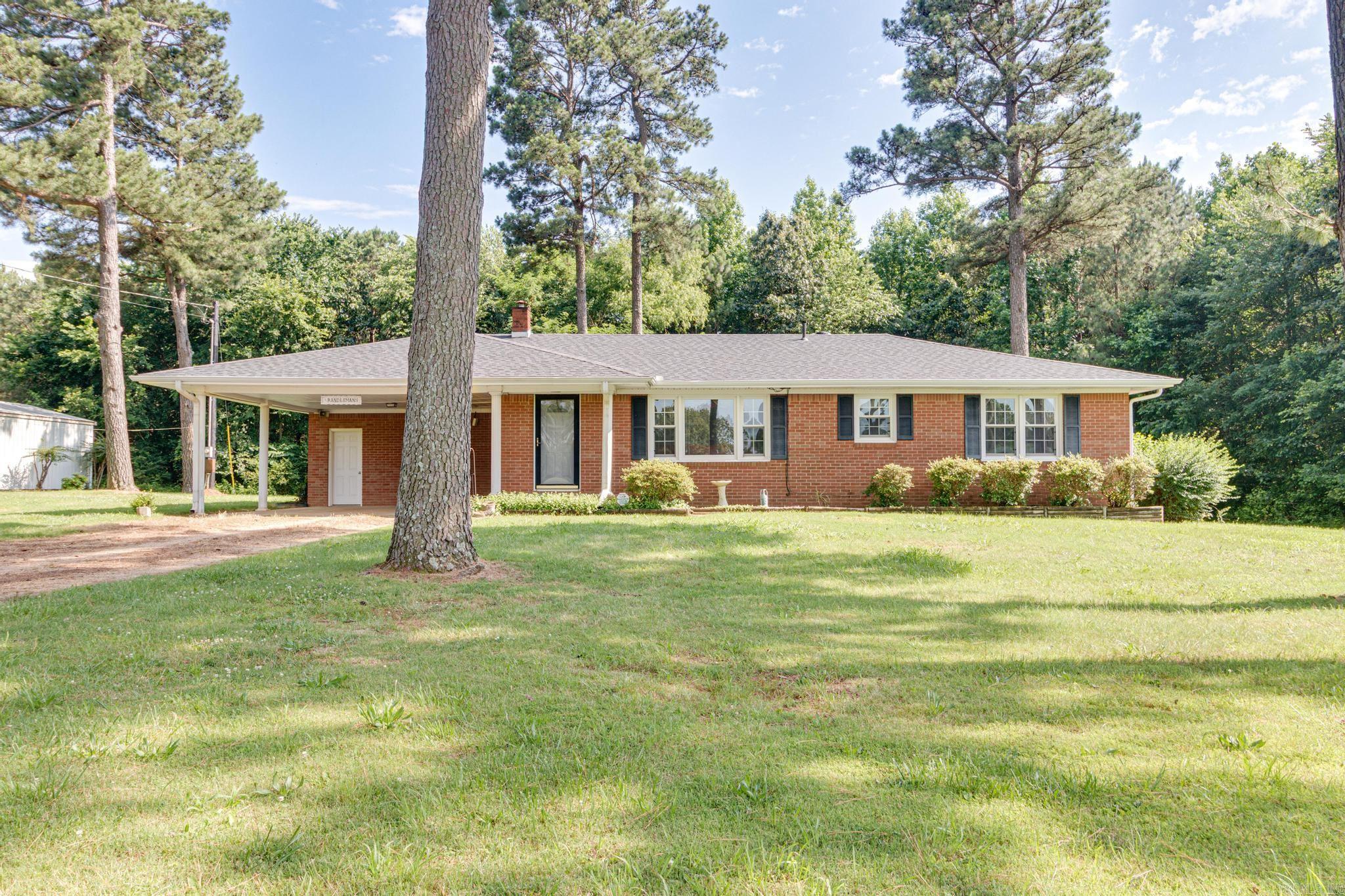 Discover peaceful country living with this beautifully remodeled one-owner home sitting on 40 wooded acres, just a short distance off Hwy 49 N in Rector! This 3 bed, 1 bath home offers 1,462 sq ft on the main level plus a 560 sq ft basement—perfect for storage, a workshop, or future living space. Nestled on the edge of the Ridge, you’ll love the abundant wildlife, privacy, and scenic natural views from the comfort of the screened-in porch. Improvements include newer cabinets, paint, flooring, and appliances, with the refrigerator staying! Roof and gutter leaf guards (2023), a new water heater (2024), Extra blown-in insulation, double hung windows, truly move-in ready. Additional backup gas wall heater for extra peace of mind. Have your morning coffee or take a look from the Screened-In Porch with serene views and abundant wildlife. 18 x 27 shop building with electric! Whether you’re looking for a weekend getaway, hunting retreat, or full-time country home—this property checks all the boxes. Opportunities like this are rare—schedule your showing today! Taxes in remarks.