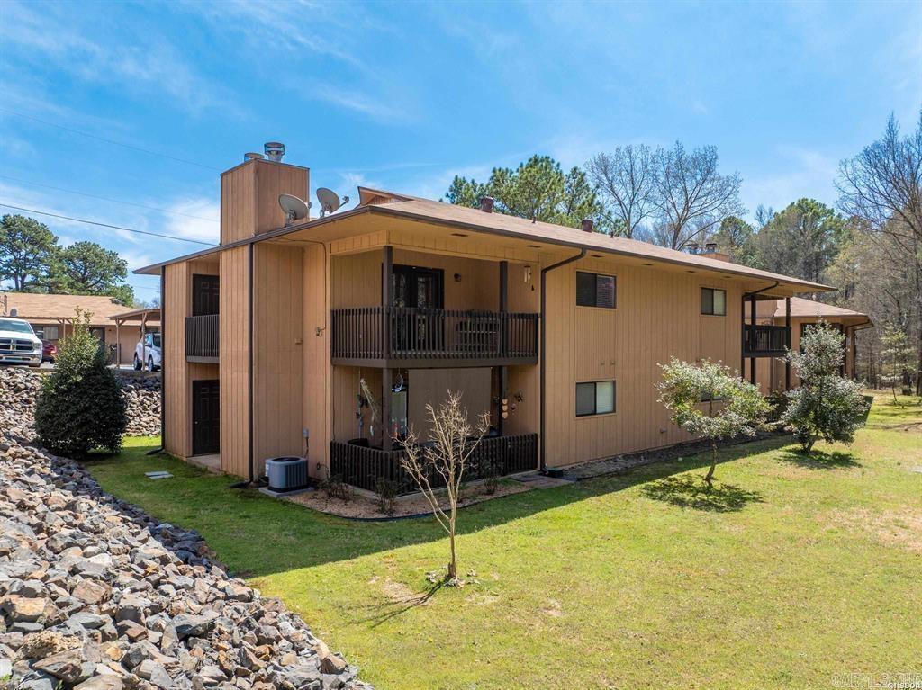 Charming 2-Bed, 2-Bath Condo in the Heart of Hot Springs! Welcome home to this inviting 2-bedroom, 2-bathroom condo nestled in the heart of Hot Springs, AR! Enjoy a serene retreat with stunning wooded views from your private balcony, perfect for morning coffee or evening relaxation. Step inside to a spacious living area featuring an electric fireplace and French doors that open to the balcony, creating a warm and welcoming atmosphere. The master suite boasts two walk-in closets and an en-suite bathroom for ultimate convenience. This well-appointed condo includes all appliances and select furnishings to make your move seamless. Community amenities include a sparkling pool and a scenic walking trail, offering plenty of opportunities to unwind and enjoy the outdoors. Conveniently located near shopping, dining, medical facilities, and more, this condo is perfect for a full-time residence or a weekend getaway. Don't miss out on this fantastic opportunity! Schedule your showing today!