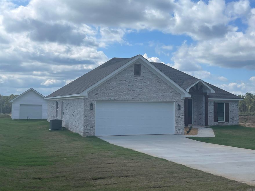 Welcome Home! This is the move you have been saving for. All brick new construction home on one acre lot with 14 X 20 shop building. Features open floor plan with fireplace in living area, formal dining room and huge breakfast bar in kitchen. Builder has installed blinds. Large primary bathroom with double vanities, separate walkin shower and large closet. Builder will pay $5,000.00 of buyer's closing cost with acceptable offer. Must See