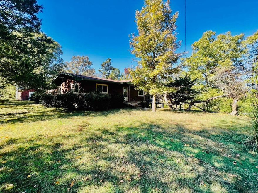 Picture yourself living in this updated home with beautiful mountain view!  Priced to sell!  Nice updated 3 bedroom 2 bath home waiting for new owners to call this house their home. Located south of Mena in private location with mountain view. Large living room, kitchen with side dining area, 3 nice size bedrooms. Enjoy the comforts of a 1 car garage with additional storage, 1 car carport on slab, storage building behind house (storage building has no value). Call for additional information and show appointment.