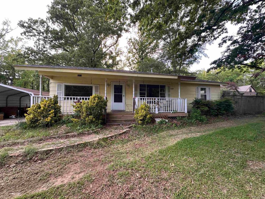 INVESTOR'S DREAM COME TRUE! This spacious 4-bedroom, 2-bathroom home offers incredible potential and versatile living options. A major highlight is the in-law quarters added to the side of the house, making it the perfect setup for multigenerational living or a rental opportunity.The home features a charming covered front porch. Interior highlights include wood & tile flooring throughout. The roof is approximately 5 years old. At closing, the property will be resurveyed to include extra land in the back, providing even more value and space. Priced to sell AS-IS. Don't miss out on this unique opportunity!.