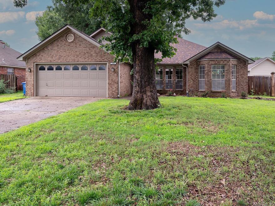 Ideally situated near schools, retail destinations, and a scenic community trail, this inviting home offers both comfort and convenience. Durable luxury vinyl flooring flows throughout the main living areas, while the bathrooms are finished with stylish tile.  The spacious living area feels bright and open thanks to tall ceilings, multiple windows, and a charming wood-burning fireplace. The kitchen is designed for both function and style with granite surfaces and an impressive amount of cabinetry. Outside, enjoy a fully fenced-in backyard along with a storage shed for additional space.