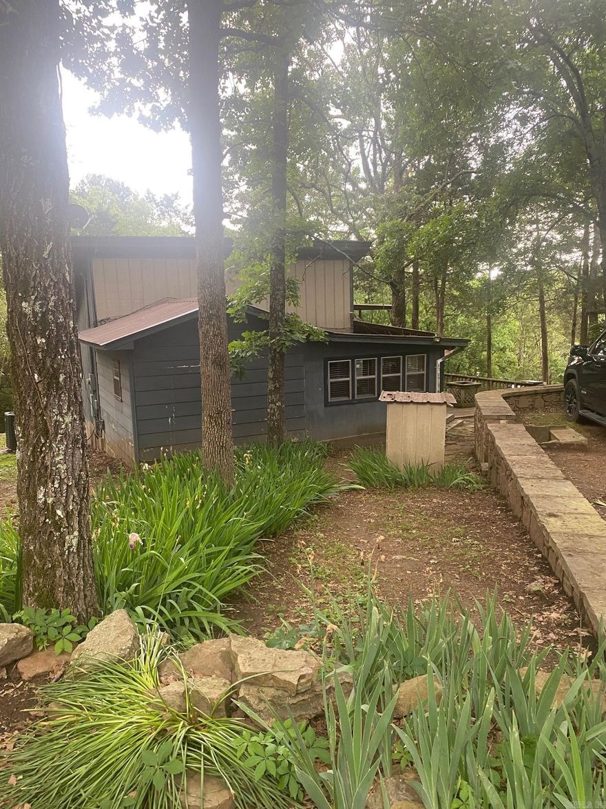 If you are looking for a getaway, check out this wonderful rustic cabin on Greers Ferry Lake equipped with lots of space for outdoor entertaining and shared boat dock!!!!  Inside cabin is beautiful with tall wood ceilings and walls! Exterior of house being painted, updated pictures to follow.