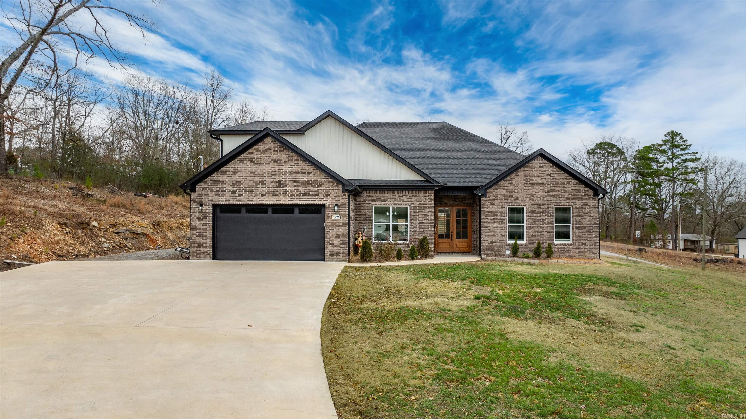 Discover this charming traditional home featuring five spacious bedrooms and three bathrooms, perfect for family living. Enjoy beautiful views and welcoming atmosphere, all within desirable school district.