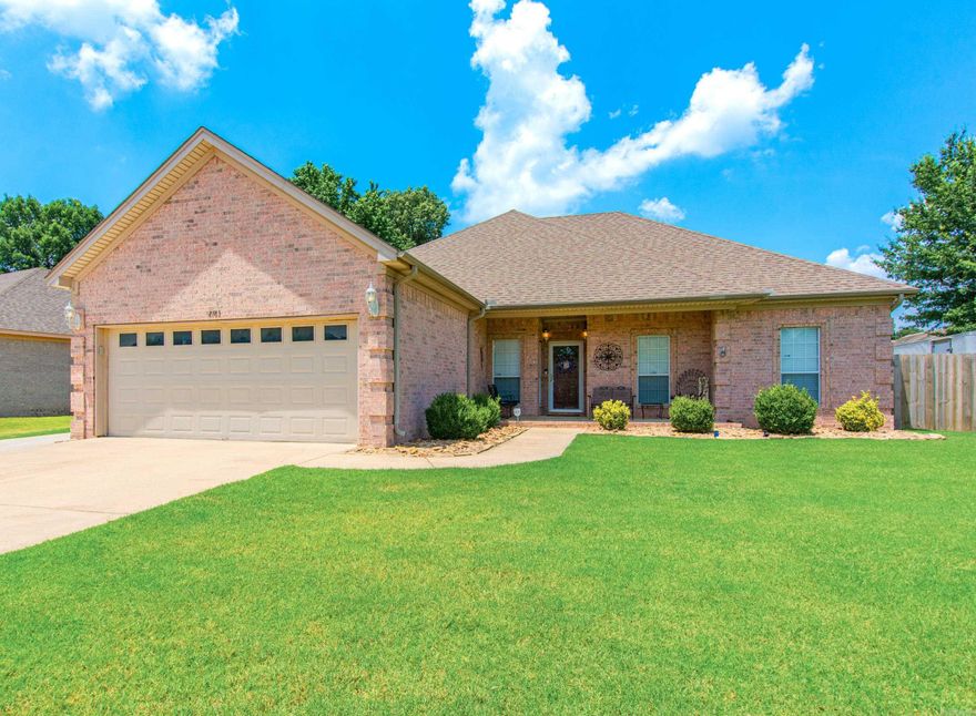 Step into the warmth of this inviting 4-bedroom, 2-bath home boasting a spacious open floor plan and a large wrap-around breakfast bar. Ideal for entertaining, it features a cozy den flooded with natural light from large windows and a convenient gas log fireplace. Tall ceilings throughout amplify the sense of space. The master suite offers a serene retreat with a jetted tub, separate shower, and a large walk-in closet, providing ample storage and relaxation space.  Recent updates include luxurious new LVP flooring, new gas stove, new dishwasher and fresh interior paint that extends across ceilings, trim, cabinets, and vanities, revitalizing the entire home.  Step outside and enjoy the expansive, oversized backyard—a perfect sanctuary for relaxation or engaging in outdoor activities. It's ideal for those considering the addition of a swimming pool. The addition of a new parking pad with camper electric hookup adds a practical convenience.  Situated in an extremely accessible area, this residence merges comfort with functionality, creating an outstanding location. ( LVP laid in additional bedrooms once vacant )