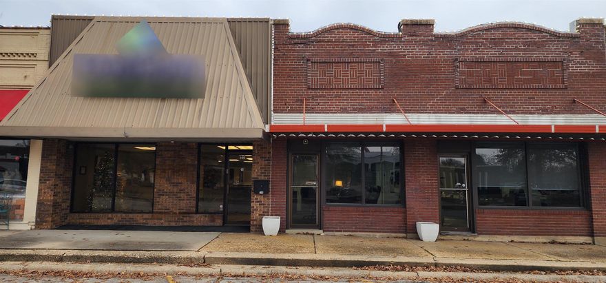 Professional office building located on historic Piggott Court Square. Located across from the Clay County Court House this two parcel office building with approximately 2700 sq ft is located in the heart of town and is conveniently located. This property is currently leased until 2031. Great opportunity to own commercial property on historic court square.