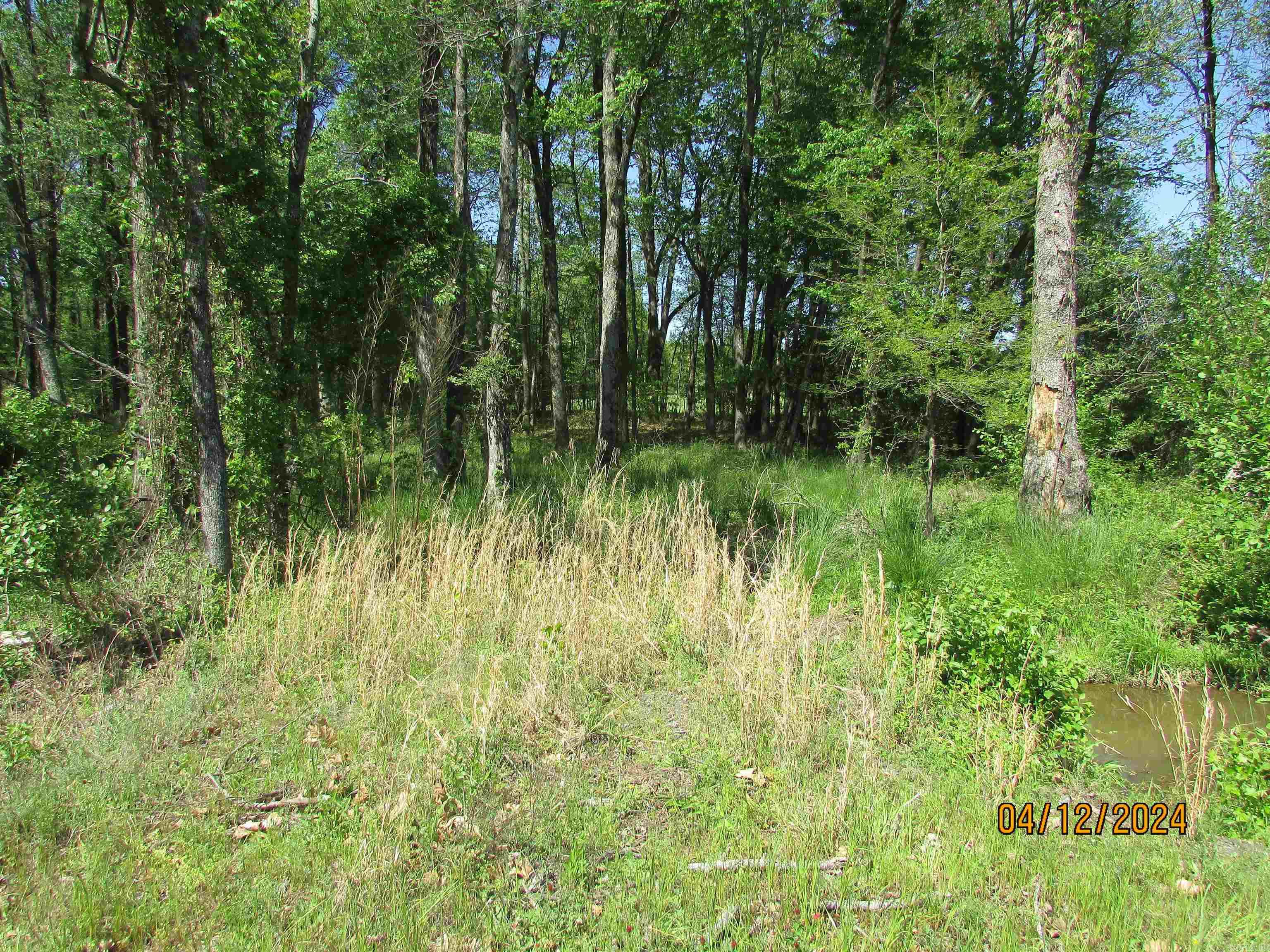 Are you ready to build your dream home? This is it. Great location. Located just outside the city limits. Existing survey available. There is a seasonal creek. Utilities at the road. Won't last long at this price.