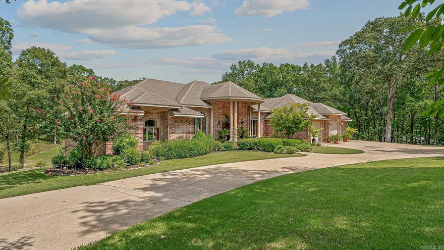 Oasis in the Outback – This extraordinary 8,000 sq ft estate blends timeless, traditional design with unmatched amenities, set on over 1.5 acres in the coveted Valley View School District. Inside, a formal dining room with an electric fireplace leads to a chef’s kitchen featuring a gas range, wall oven, ice maker with filtration, and walk-in pantry. The kitchen is open to a richly appointed hearth room, featuring a gas fireplace framed by custom built-ins.  Expansive double-level patios, each with a wood-burning fireplace, provide sweeping views of the 28,000-gallon saltwater pool with waterfall. The opulent primary suite boasts a 3-sided gas fireplace, washer/dryer hookups, dual toilets & closets, four sinks, jetted tub, and walk-in/walk-out shower. A guest suite is beside the primary, with two more bedrooms sharing a Jack-and-Jill bath are across the home. The full walkout basement is an entertainer’s paradise with a hibachi grill & custom table, theater with stage & seating for 10, workout room, safe/storm room, 2 flex rooms (which could be a 5th and 6th bedroom), 2 full baths, laundry, and 4th garage/workshop. Privacy, prestige & resort vibes—all in one incredible property.