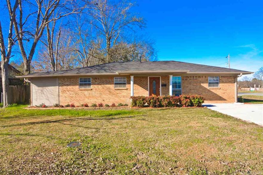 Totally remodeled on corner lot with beautiful view of open fields across the way. Updated from top to bottom, new roof, guttering, extra large two car garage that will easily accommodate two large vehicles. Kitchen includes new cabinets, new countertops, stainless steel appliances, (fridge stays). Baths have gorgeous new showers/tubs.  New paint, flooring, hardware, fans, 2 new hwh, has 2 master bedrooms, top quality throughout. Must see to appreciate!!!! See showing instructions