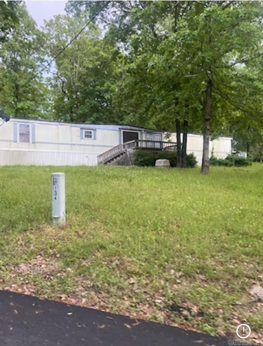 3bd/2ba Mobile Home on .63 acre corner lot.  Nice neighborhood close to Lake Hamilton School.  Selling as is. Owner/agent.   Please call to schedule showing with listing agent.