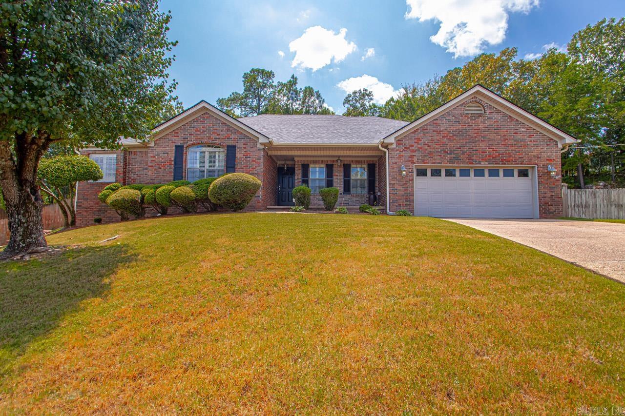 AMAZING 1-level updated brick in move-in condition, enclosed with privacy wood fence & brick wall & patio with pergola-added this year. Patio furniture included except urns; fountain stays, with 2024 new pump. Hardwoods throughout, tile, some carpet, fireplace with logs open to both den-family room & kitchen/hearth-room. Built in bookshelves. Washer/dryer/fridge/FP screens, shelves on west side of garage, custom drapes, plantation shutters & blinds plus trampoline & Barnhart Furniture in master from White's furniture except antique desk all remain. Lift from 2-car garage to floored attic. Office furniture (long desk, smaller computer desk, file cabinet, hutch) remain. Living room being used as office/music room. Tankless HWH. New in 2024, 50-year architectural Corning Roof, gutters & under-counter lighting in kitchen. T-shaped breakfast island. Corian counters. All closets custom designed by Closet Factory. SONOS Sound System remains. 2 speakers in den, 2 in kitchen, 2 on patio. Sprinkler System has had the backflow replaced in 2022. PLEASE ASCERTAIN NEW TAXES! THIS INFO REFLECTS FROZEN REAL ESTATE TAX! SHOW AND SELL!