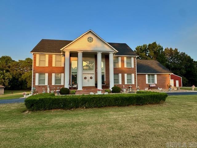 Immaculate 4–5 bedroom, 3-bath home on 2.5 acres with modern updates, a shop, and a park-like setting! Welcome to 2903 Purcell Road, offering approx. 3,700 sq. ft. of living space surrounded by mature pecan trees and a yard with plenty of room for a pool or entertaining. A 30x30 metal shop with electricity and automatic garage door is perfect for storage, hobbies, or third-car parking. The circle blacktop drive creates an impressive approach leading to a beautiful entry. Inside, enjoy an open floor plan featuring a chef’s kitchen with granite countertops, double oven, stainless appliances, new microwave (2025), and freshly painted cabinets. The living area includes built-ins, a painted entertainment center (2025), and an electric fireplace. Extras: double vanities in baths, large laundry with sink, built-in desk, and multiple flexible spaces including den/office/formal dining. Recent updates: roof (2022), CHA upstairs (2023), carpet (2023), gutters/shutters/screens (2020), lighting/fans (2018–2020), flooring (2018). Conveniently located in Paragould with small-town charm and easy access to amenities. Truly move-in ready—schedule your tour today!