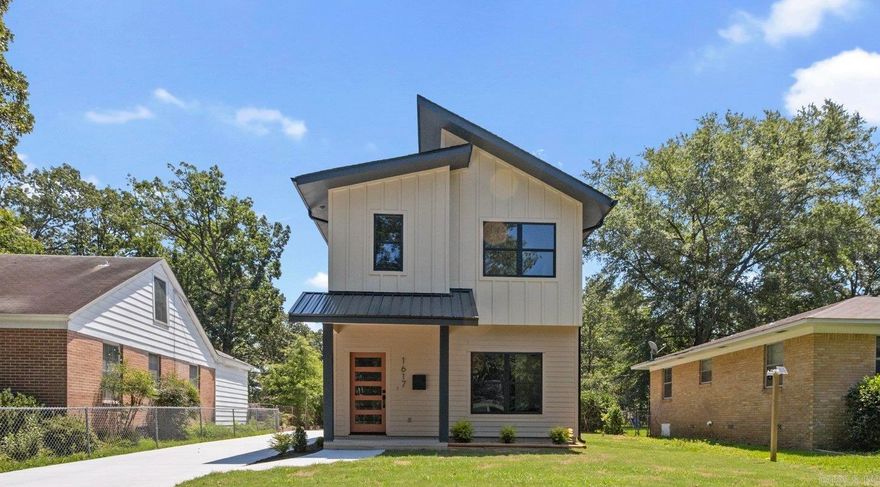 Welcome to this stylish new construction home! Featuring 3 bedrooms and 3 bathrooms, this home comes equipped with an open floor plan, vaulted ceilings in the primary bedroom, custom cabinetry in the kitchen, quartz countertops, a pot filler, wrap around concrete driveway, low-maintenance concrete floors downstairs, Hardie siding, a large backyard, and spray foamed insulation throughout for high efficiency! Conveniently located near UALR, hospitals, and midtown amenities, this home is a must-see!