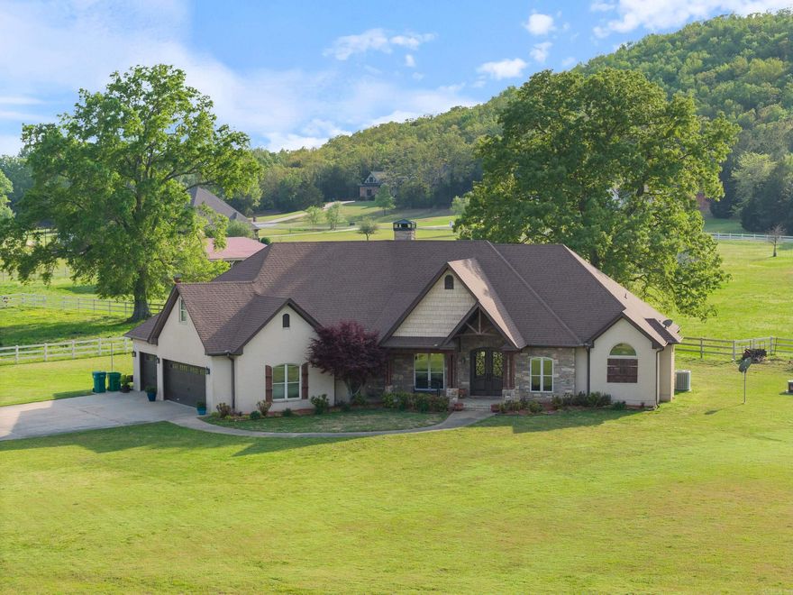 Welcome to your dream farm/horse property! This beautiful custom-built home on 10 acres offers 4 bedrooms and 3.5 baths—or configure it as 3 bedrooms plus a dedicated office and a spacious game room. Nestled on 10 stunning, cross-fenced acres, it's perfectly set up for horses and outdoor living. The home has been thoughtfully updated with brand-new windows along the back, fresh paint throughout, new carpet in the bedrooms, a newer roof, and a new dishwasher. The spacious primary suite includes a large walk-in closet and a gorgeous bathroom featuring a walk-in shower with dual entries. You'll love the cozy, double-sided wood-burning fireplace, beautiful stained concrete floors, and a convenient laundry room that includes a built-in storm shelter. A 3-car garage offers ample space for vehicles and storage. Outside, the property truly shines with a well-equipped barn featuring stalls, a wash bay, and a tack room, along with an underground electric dog fence spanning the entire 10 acres. All this is located just 15 minutes from town, offering the perfect blend of peaceful country living and convenience. Don’t miss this incredible opportunity—schedule your showing today!