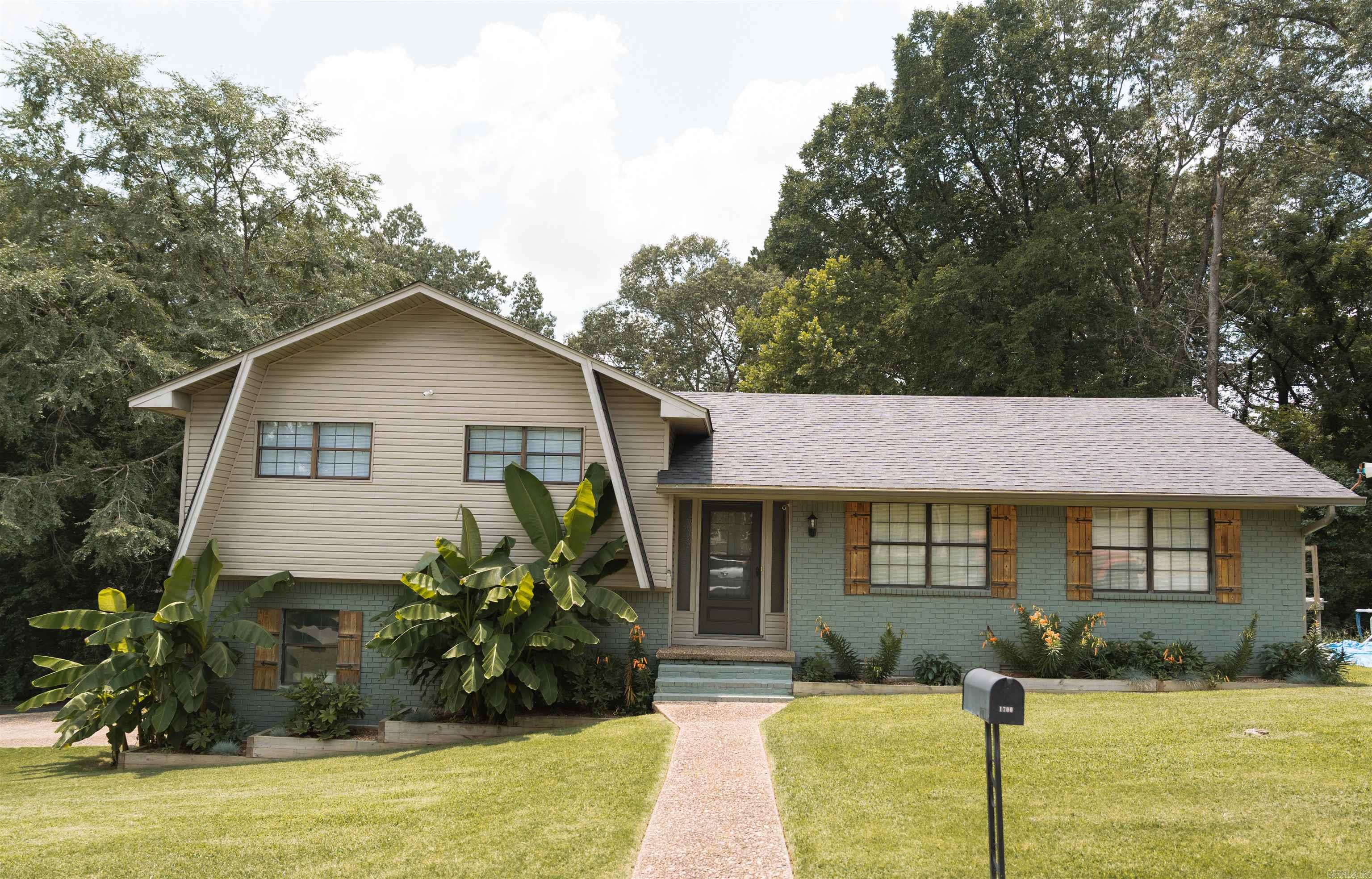 Welcome to this beautifully maintained and updated split-level home nestled on a spacious .85-acre lot in a peaceful, tree-lined neighborhood. This home blends classic charm with modern upgrades, making it a perfect choice for families or anyone seeking comfort and style. Inside, youāll find a brand-new HVAC system, roof, hot water heater, and dishwasherāall installed to provide peace of mind and energy efficiency for years to come. The home features a unique exterior with fresh paint, natural wood shutters, and lush tropical landscaping that enhances curb appeal. Step inside to a functional floor plan with bright windows, generous living areas, and a welcoming kitchen ready for entertaining. Enjoy the outdoors on the expansive lot with plenty of room for gardening, play, or future additions. The backyard is private and backs up to mature trees, offering a serene escape from the bustle of daily life. Key Features: ⢠New roof, HVAC, hot water heater & dishwasher ⢠Spacious .85-acre lot with established landscaping ⢠Attractive curb appeal with custom shutters & brick exterior ⢠Quiet, established neighborhood ⢠Great natural light