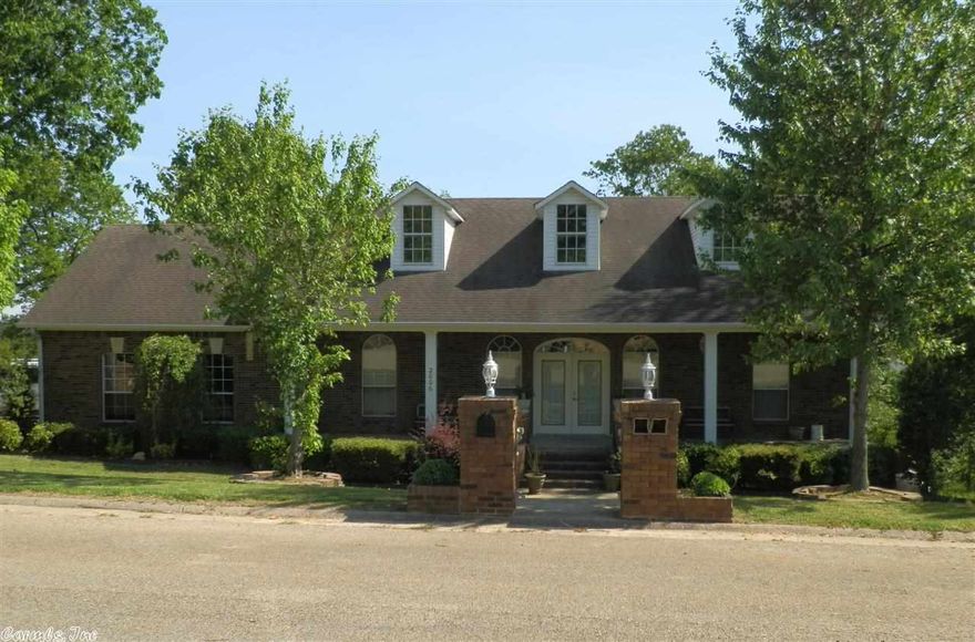 This house has all the SPACE you could possibly need. Large open area for entertaining guests. Five bedrooms, four baths for growing family. Basement for shelter from storms. Kitchen upgraded with granite countertops and new appliances in 2013. Two gas fireplaces. Two AC units - 2.5-ton unit plus 5-ton AC unit which was replaced in summer 2011. Has two water heaters, detail ceilings and loads of crown molding. Nice attached 3-car garage. Bonus 16X22 workshop in basement plus additional 18X22 detached shop.