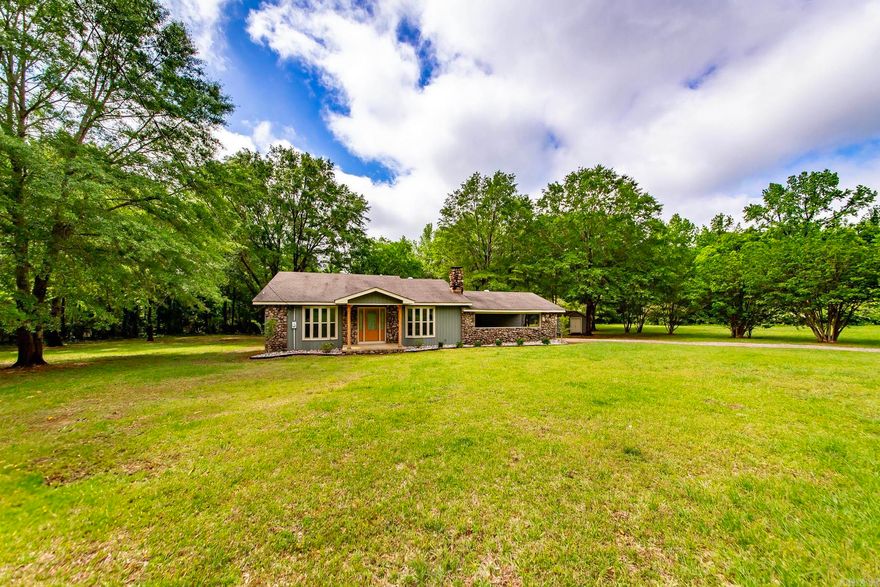 Fully Renovated Home on 8 Wooded Acres  Step into modern country living at its finest. This beautifully renovated 3-bedroom, 2-bath home sits on 8 serene, mostly wooded acres—offering both privacy and upscale comfort.  Every detail has been thoughtfully updated: new flooring, custom cabinets, sleek countertops, modern wiring and plumbing, new HVAC, and designer light fixtures—all move-in ready with quality craftsmanship throughout. The owner has also added a brand-new full bathroom, creating a comfortable and functional space for families or guests.  A bonus home office off the carport adds flexibility for remote work or creative use. Outside, enjoy the quiet of nature, room to roam, or build out your outdoor lifestyle vision. Whether you’re sipping morning coffee under the trees or entertaining on a crisp fall evening, this property offers the kind of setting people dream of.  Located just outside of town with the peace of the countryside and the ease of access to nearby amenities, this home blends timeless charm with modern convenience.