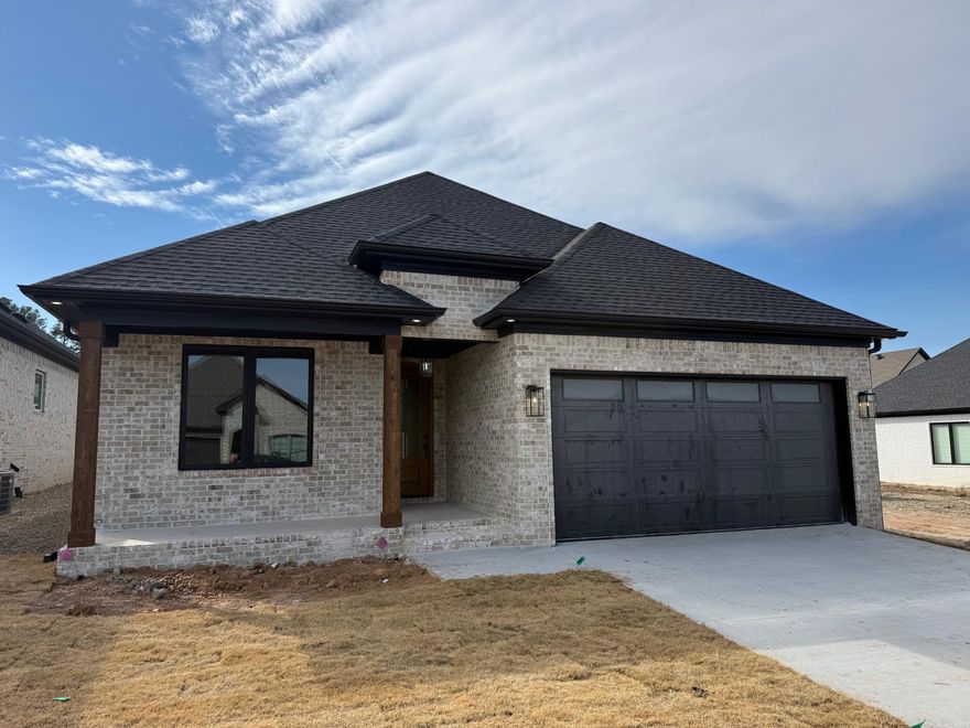 Check out this beautiful new construction located in Fletcher Valley!  This home has a covered front porch,  privacy fence, blackout blinds and a 60" flat screen for the living room.  Gas range, wall oven, and built-in microwave. 2 Year builder warranty!  Builder is licensed Realtor.