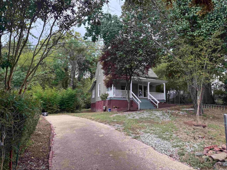 Welcome to 209 Elizabeth Terrace, a newly remodeled bungalow-style home offering 4 bedrooms and 2.5 bathrooms. This two-story property features a fenced yard and includes an additional lot that backs up to the opposing road, providing extra space and potential. Updates include brand-new electrical, plumbing, HVAC, and appliances, making it move-in ready. Nestled in a quaint neighborhood near Hot Springs National Park and surrounded by scenic biking trails, lakes, and the National Forest, this location is ideal for outdoor enthusiasts. Just minutes from Oaklawn Casino, this home offers convenience with a touch of nature. A must-see property blending charm, comfort, and opportunity.