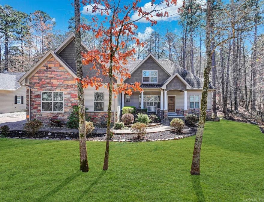 Discover timeless elegance in this 4-bed, 3.5 bath haven offering 3,012 sq ft in the beautiful Hot Springs Village-perfectly positioned across from scenic Lake Coronado. Step inside to an airy open floor plan filled with natural light & a dramatic 14-ft ceiling that welcomes you into an impressive front living space ideal for gathering & celebrations. A piano perfect for entertainment, conveys w/home. The chef inspired kitchen boasts stainless steel appliances including microwave, stove, dishwasher, & fridge creating a stylish & functional culinary space. All electric except gas/propane for stove and optional for wood burning fireplace. Convenient large washer & dryer, conveys w/home. Enjoy a large washer & dryer, an oversized 84 gallon water heater, & an add’l fridge in the garage, all included. Designed for space w/walk-in closet spaces, storage space, & floored attics w/shelves & lighting. Upstairs, discover another gorgeous bedroom & bath also a huge bonus room for game room, gym, home office, or theater. The versatile space includes a fridge, cabinetry, TV, and massage chair - all conveys. Make this gorgeous home across from the lake yours – schedule a private tour today!