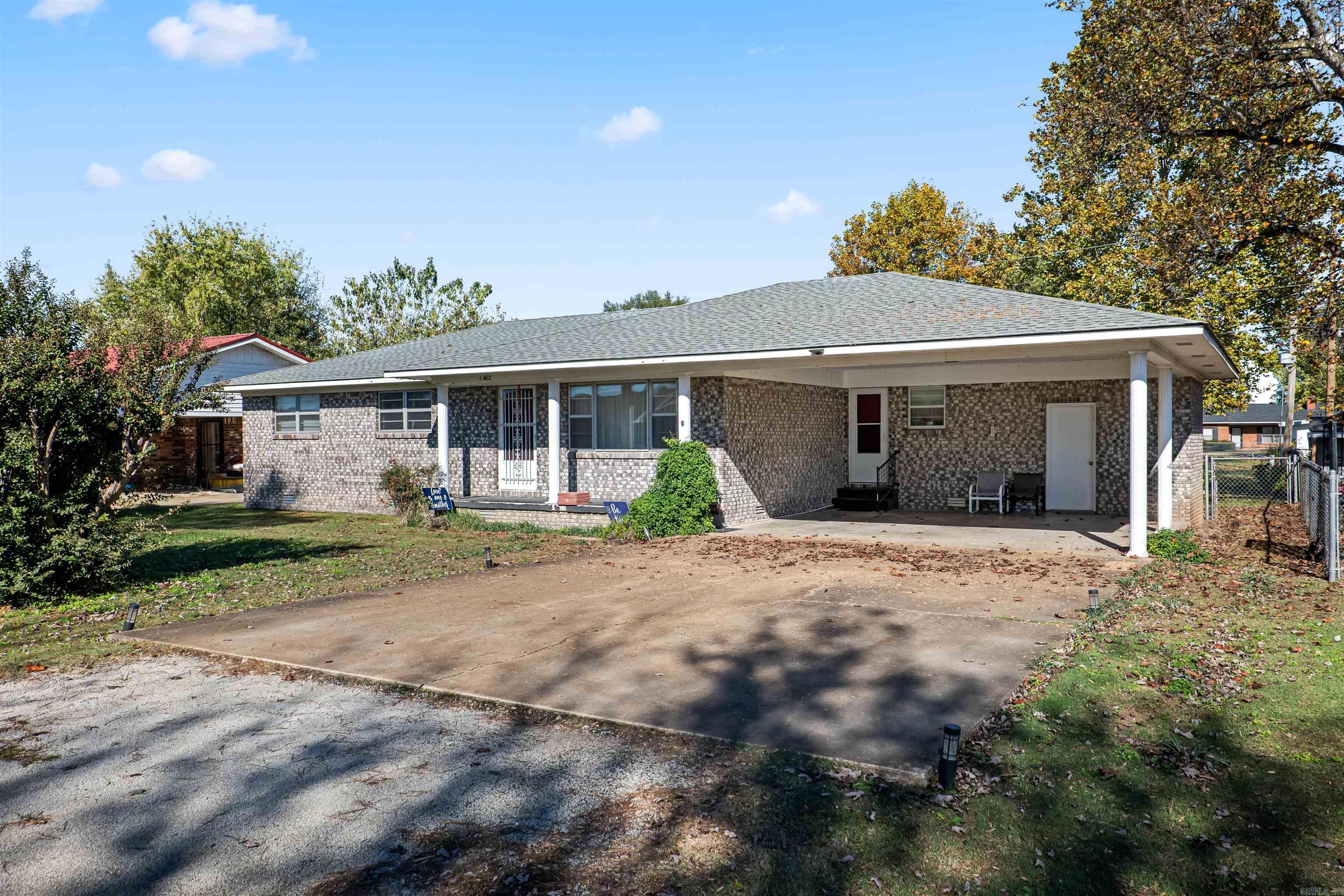 This inviting 3-bedroom, 2-bathroom home offers spacious and flexible living with two separate living areas, ideal for relaxation and entertaining. The kitchen is outfitted with newer appliances, including a dishwasher, stove, LVP flooring, and a recently upgraded water heater, ensuring efficiency and convenience. A new roof installed in 2022 adds to the home's durability and peace of mind. Out back, a fenced yard provides a great outdoor space, perfect for pets, gardening, or gatherings. The location is a major perk close to popular shopping centers and a variety of dining options, making it a convenient and desirable. Call today to make this house your home in time for the holidays. Call or text for additional information or to schedule your tour!