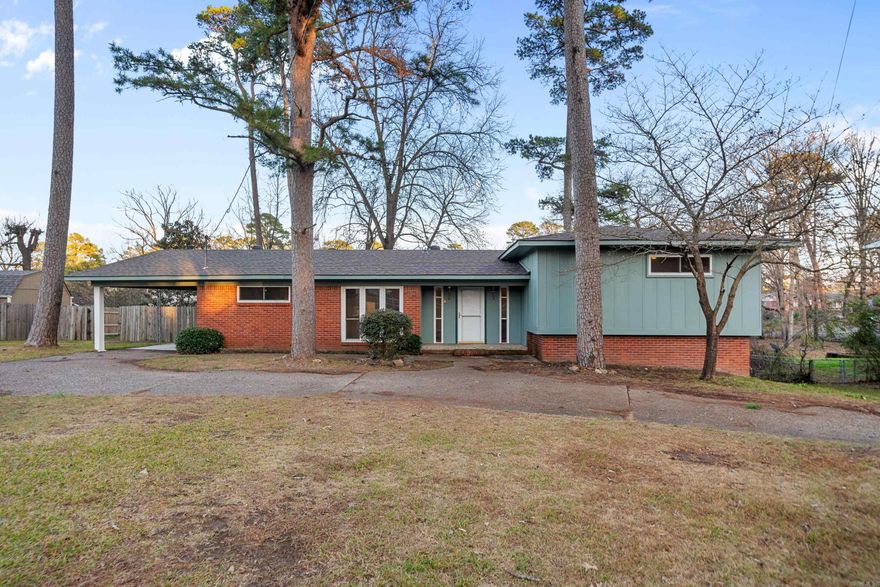 This is a great home in Lake Hamilton School District with a Mid-Century feel--Includes a large Den and a separate Family Rm with stone fireplace--New DW in 2024--Many other renovations and updates in 2022--The property has a large fenced in back yard with storage rm under the home...The circle drive is so convenient for guests and adds lots of curb appeal! Property has been used as a long term rental for the last 2 yrs and the rent was $1600 a month. Sq ft on Act Data is wrong, 63' was added for laundry rm.