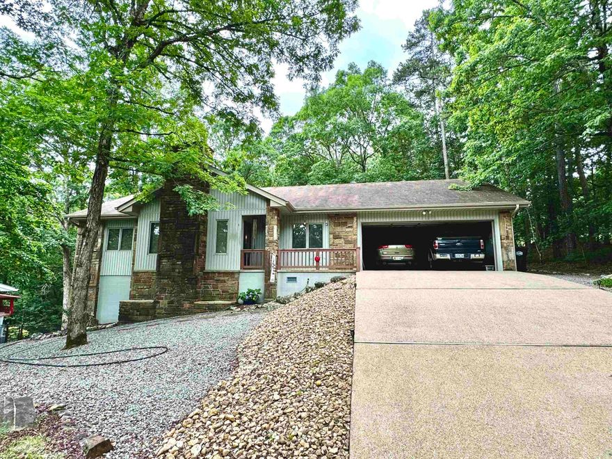Welcome to 1 Sierra Drive, a charming 3-bedroom, 2-bathroom home nestled in the peaceful community of Hot Springs Village, AR. This inviting retreat offers a low-maintenance yard, breathtaking views, and a thoughtfully designed living space that blends comfort with convenience.  Situated just 1,000 feet from Lake DeSoto, this home provides scenic lake views and easy access to outdoor recreation. Enjoy the added peace of mind with a full tornado shelter/basement, offering ample storage and versatility. Whether you're looking for a serene getaway or a permanent residence, this home is the perfect place to relax and unwind.  Don't miss your chance to own this beautiful property—schedule a showing today!