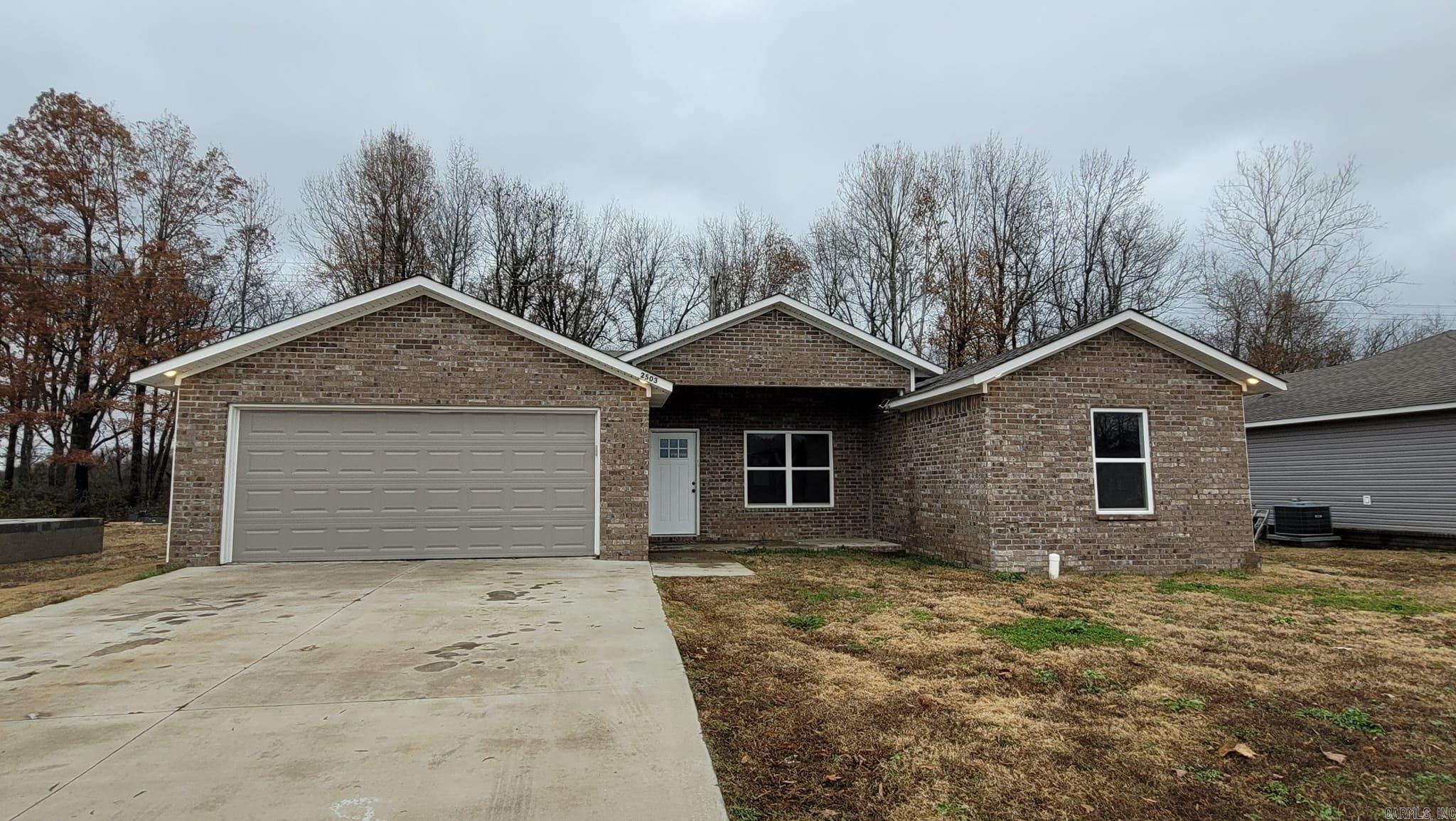 This 2023-built, all-electric, 1,569 sqft (approx.) brick and siding home sits on a 68x108 lot and features a slab foundation with a two-car garage. The spacious layout includes four bedrooms, two bathrooms, and a large walk-in closet with a shower in the primary bedroom. The home boasts decorative ceilings in both the primary bedroom and living room, adding a touch of elegance. It is energy-efficient home.  Flood insurance is required. The seller is also offering assistance with closing costs, termite coverage and elevation certificate is available.