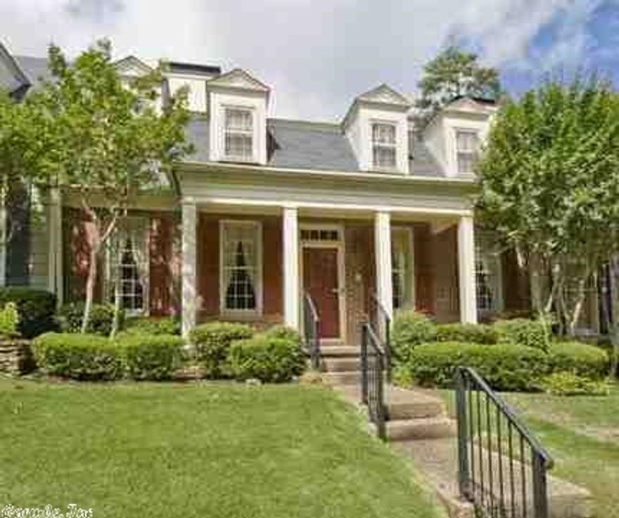 Beautiful one owner West LR condo in excellent condition. Main level hardwoods throughout, kitchen open to den w/fireplace, wet bar & icemaker, formal dining room, formal living room w/fireplace and book shelves, powder room, laundry room, master bedroom with French doors to courtyard with water feature. Master bath with separate shower & tub & bidet. 2 walk in closets. Upstairs has 2 large bedrooms, bath with walk in shower, separate tub, large walk in closets & walk in attic.  Wonderful buy!