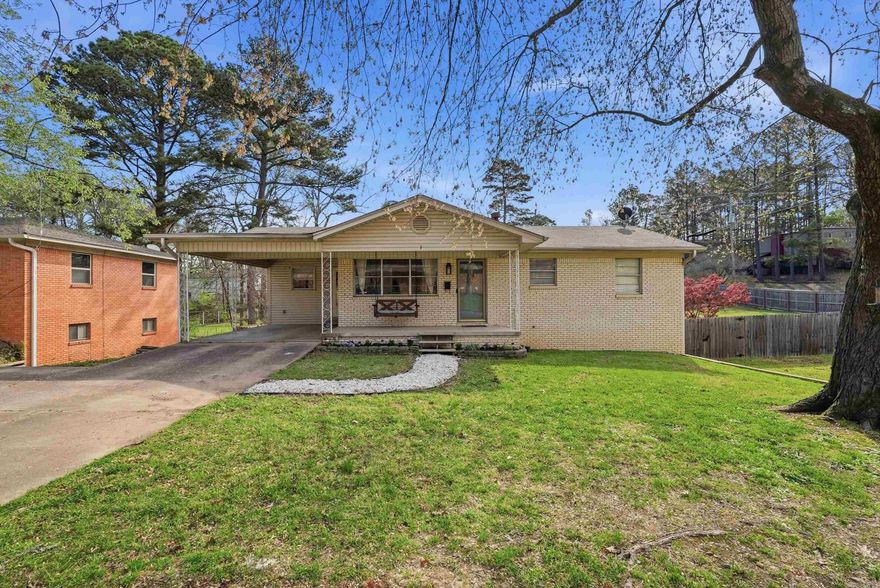 There are homes that feel lived-in in the best possible way — where the bones are solid, the character is real, and the layout actually works for the life you're building. 3 Birchwood Circle is that home. This 4-bed, 2-bath midcentury ranch on a cul-de-sac delivers all the space you need and more across two distinct living levels — each with its own personality. The main level is warm and grounded: original hardwoods, updated kitchen, and three guest bedrooms that share a full bath. Downstairs, the primary suite feels like a retreat — large walk-in closet, soaking tub, walk-in shower, and a second living space that flexes as an office, playroom, or family room. Outside, a double lot with a fully fenced, oversized backyard gives everyone room to breathe. Front porch. Back patio. Mature lot on a quiet cul-de-sac. Two minutes from Trader Joe's and Whole Foods. Easy I-630 access. This is West Little Rock at a price point that still makes sense — and a home that has room for everything your life is becoming. Agents see remarks.