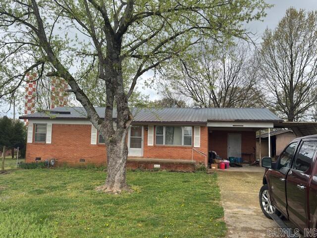 Fixer-upper, 3 bedroom brick ranch style home in Riverview Subdivision. Has hardwood floors, metal roofing, carport, central heat and air on approximately half acre lot. Back deck needs to be replaced USE CAUTION