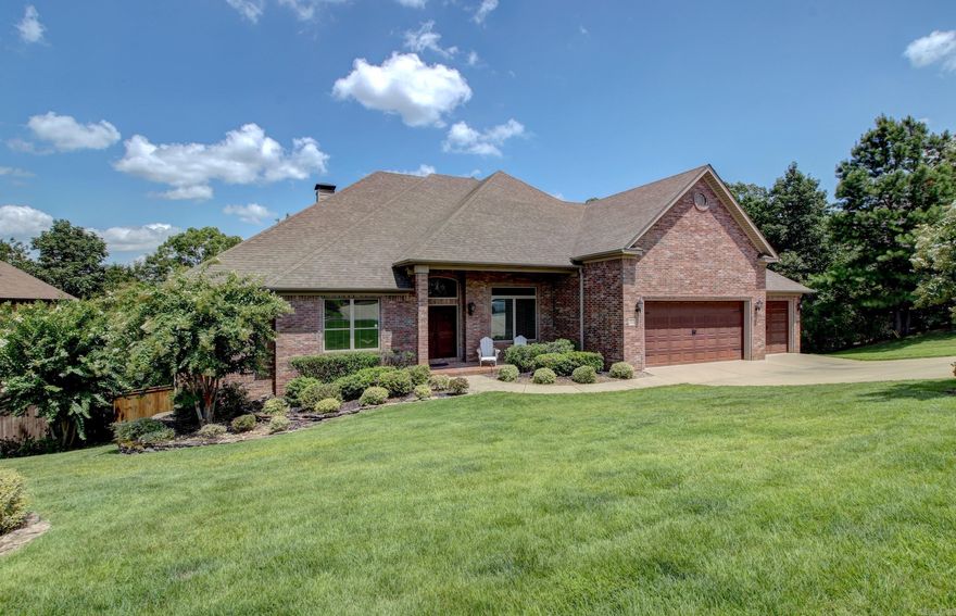 BEAUTIFUL HOME IN WOODLANDS EDGE! You will love the location and feel of this home.  Mainly one-level living with a fabulous Media/Game Room upstairs.  Wonderful, open floor plan with large formal dining and butler's pantry and expansive kitchen with large center island, separate bar area and spacious breakfast area.  Primary Bedroom is tucked in the back for privacy and the bath is lovely with dual vanities, and large walk-in closet.  Guest Bedrooms are separate of Primary, all have wonderful closet spaces and individual baths.  (4th BR currently being used for office).  You will love the detailing that runs throughout this home.  Convenient Mud Room/drop area as you enter from garage and large laundry room.  Oversized 3 car garage. You will love the additional storage under this home that has a concrete area for easy storage  or workshop space.  This home backs to lush greenspace.  Whole House Generator, too!  (Media Equipment, seating and pool table all remain.)