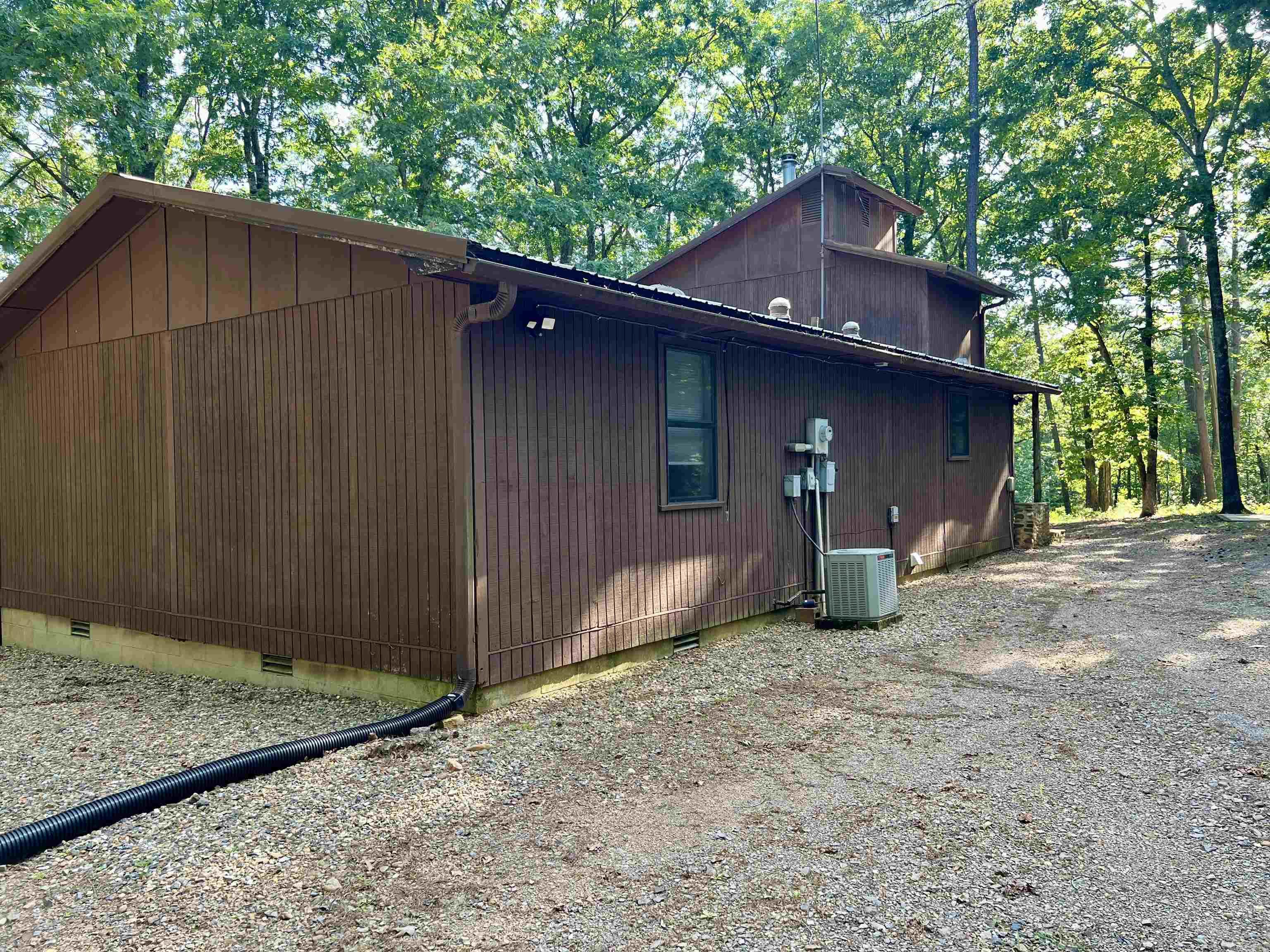 WELCOME to Your Private Retreat! Nestled on 15.40 peaceful acres this charming and secluded 2- bedroom,1-bath home offers the perfect blend of comfort, functionality , and serenity. With 1552 sq ft. of living space, you'll enjoy a cozy den. a dedicated study, a storm shelter for peace of mind, or maybe a basement for storing all your food. Whether you're seeking a relaxing retreat, a functional homestead, or a quiet place to work and unwind, this is the property. Also has a pond.