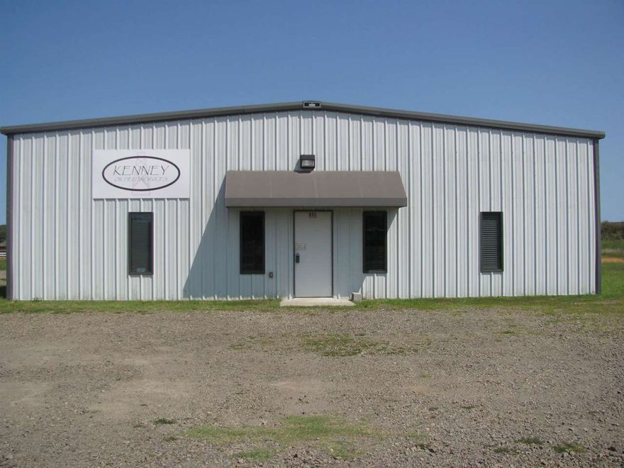 Like new building with large open reception area and waiting room. Also, small kitchen and break room, 2 offices with bathroom.  Warehouse space with 3 power overhead garage doors and loft storage area. Air compressor and multiple air hook-ups for air tools, a 10,000 lb vehicle lift all convey. See attached inventory list for sale as well. Filing cabinets and refrigerator do not convey.